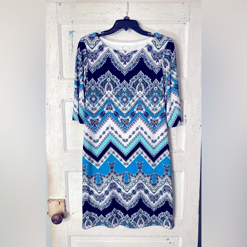 Mid-length dress can transition from day to evening wear.